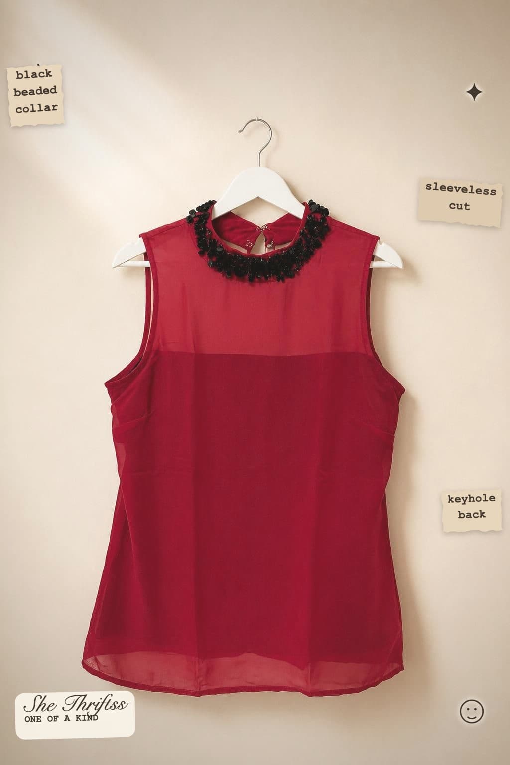 Beaded high neck sleeveless top