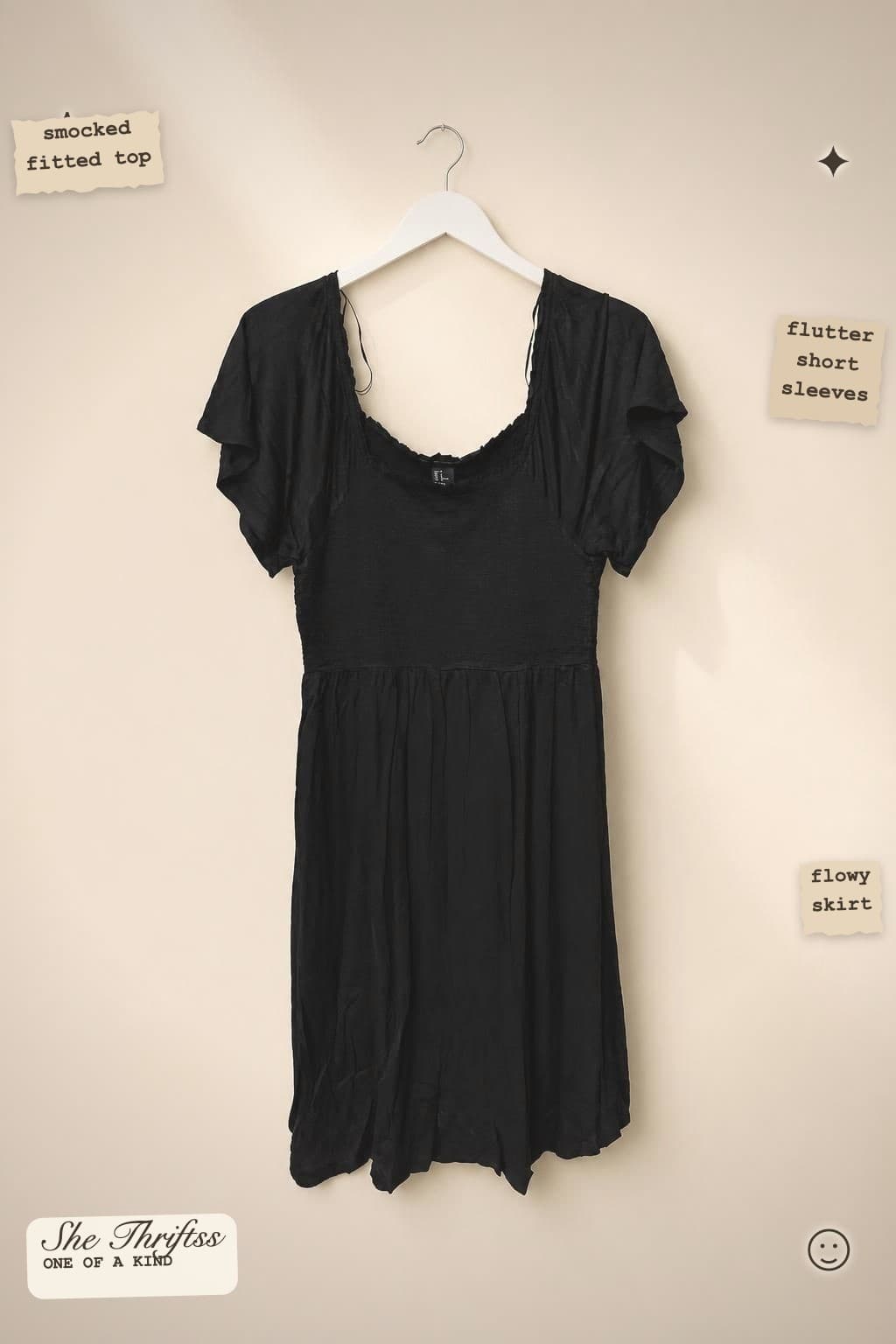 Black smocked bodice dress
