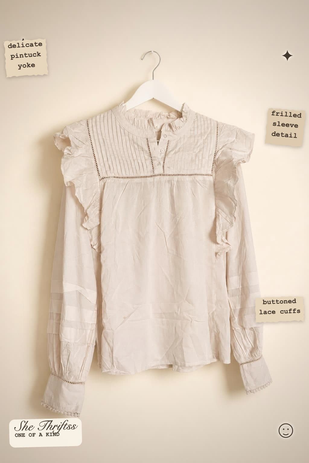 Pale pink frill blouse