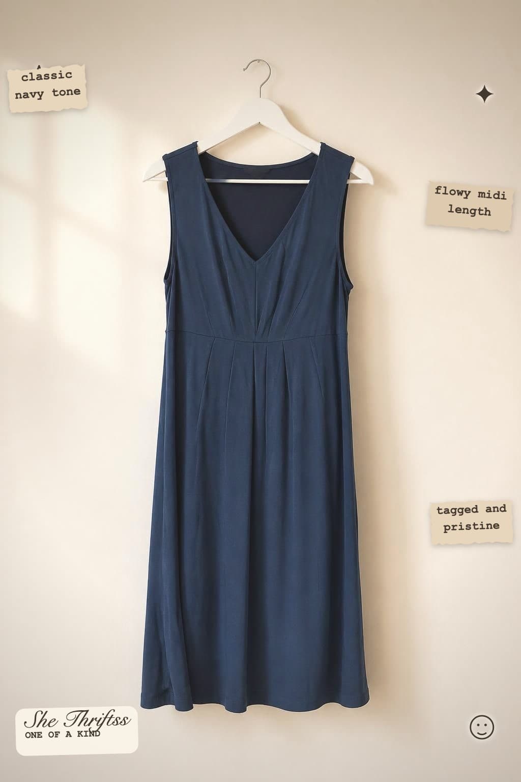 Sleeveless navy V-neck dress