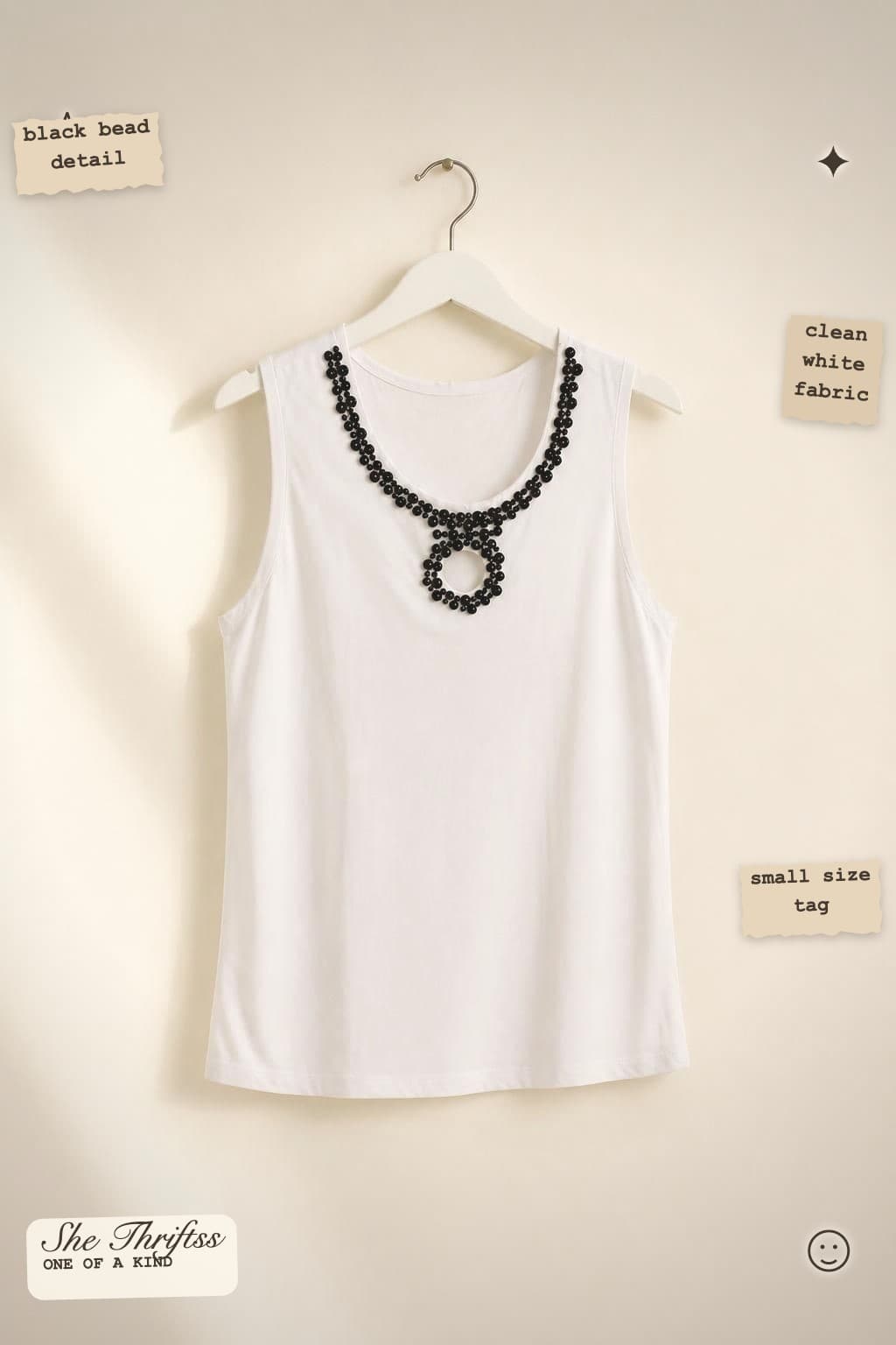 White beaded sleeveless top